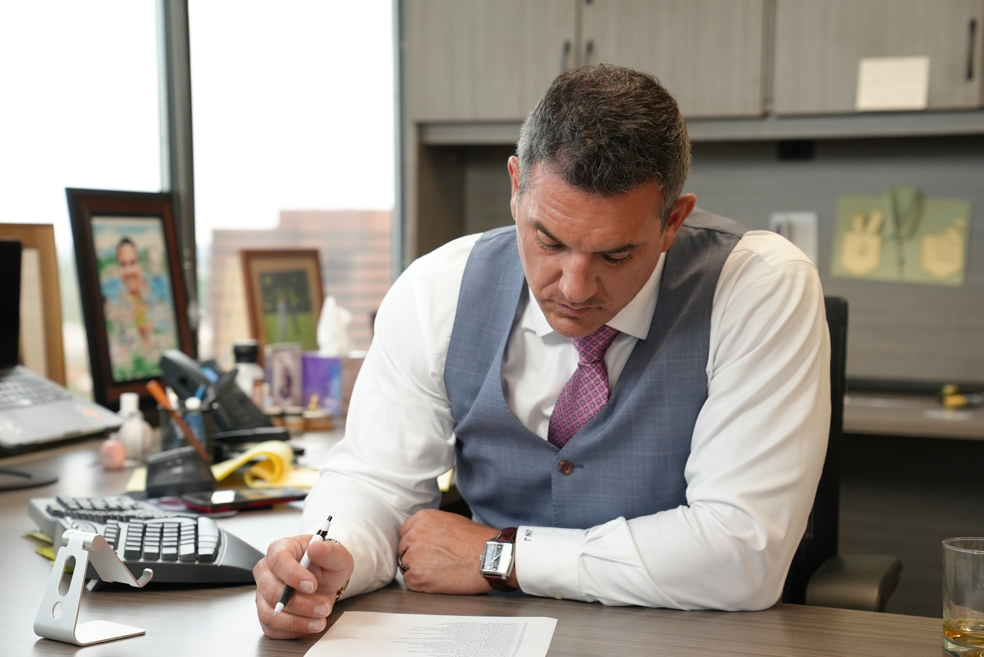 Jason W. Jordan at his desk in Denver